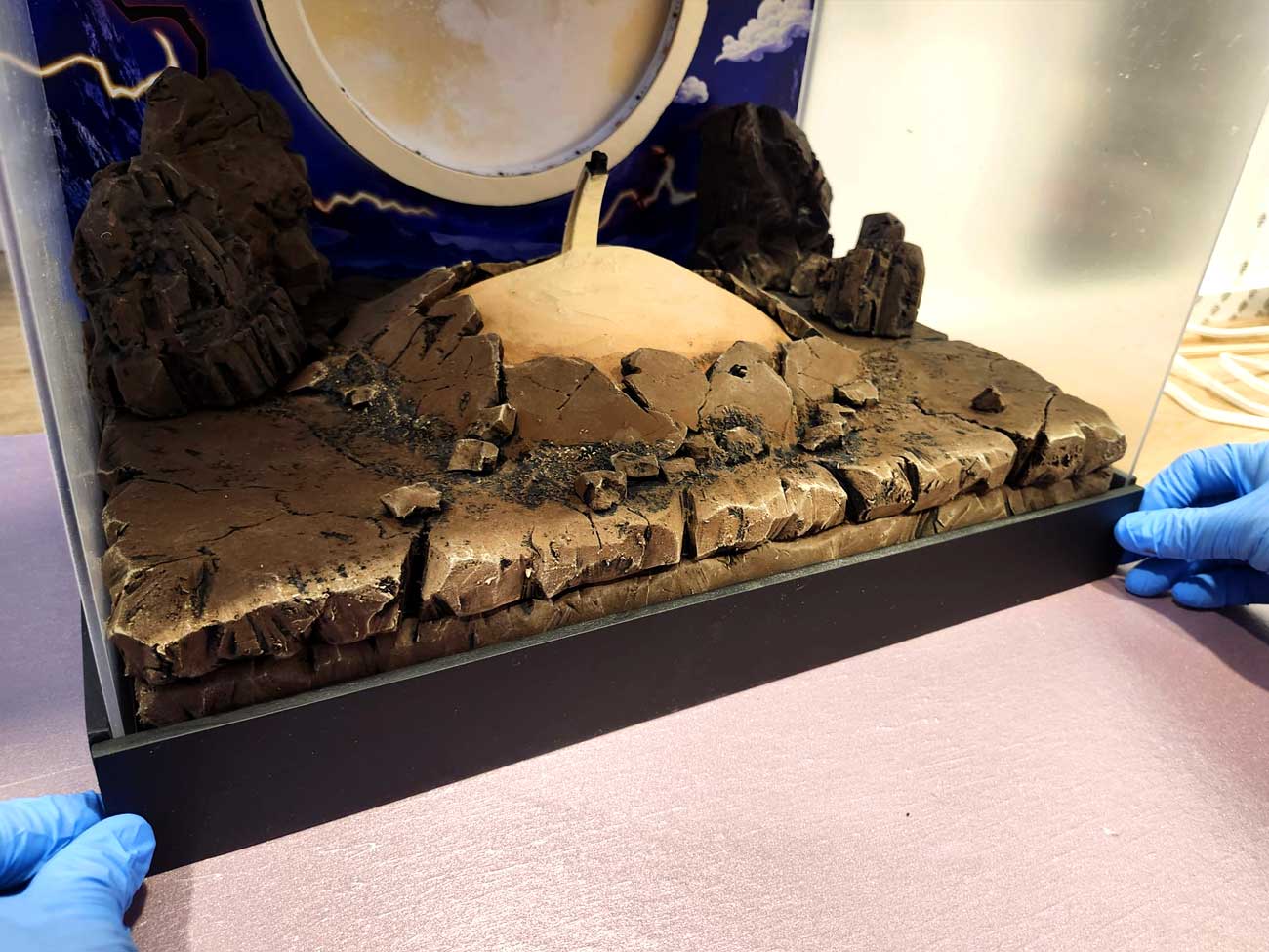 Bringing-Every-Element-Together3 Fully assembled Gear 5 display case with illuminated moon and handcrafted terrain.